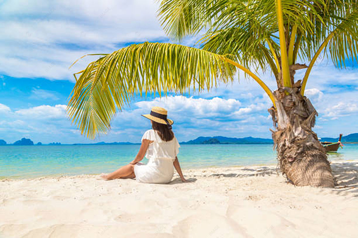 Pose under a Palm Tree